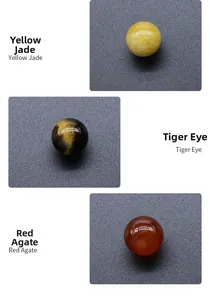 Polished round beads made of natural yellow jade, tiger eye stone, and red agate gems