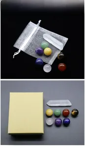 Chakra healing crystal set with 7 spheres, clear quartz point, and premium packaging