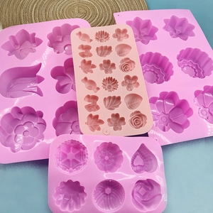 Pink tulip and heart silicone molds for DIY scented candles, soap, and resin crafts