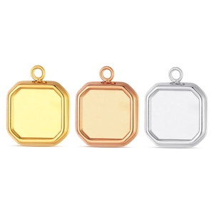Three colors of stainless steel square heat transfer photo frame pendants on white