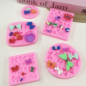 Pink food grade silicone fondant molds set with bow and crown shapes for DIY baking