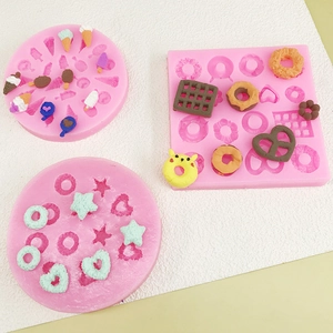 Pink silicone mold set for DIY miniature clay donuts, ice cream, and waffles