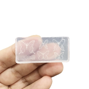 Transparent silicone butterfly nail art mold with five detailed butterfly designs