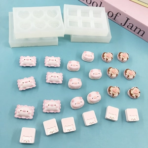 Silicone molds for DIY resin art featuring pig, heart, and bear chocolate shapes