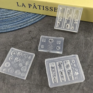 4-piece silicone nail art molds with Chinese floral and lucky coin relief designs