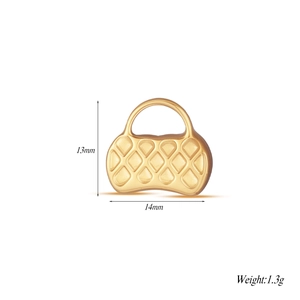 Macro detail of 13mm quilted handbag charm in gold-plated stainless steel for DIY jewelry
