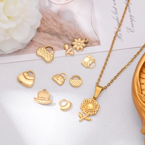 Gold stainless steel sunflower necklace and assorted DIY pendants in elegant setting