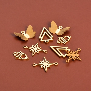 Gouden roestvrijstalen DIY bedeltjes set met vlinder hamsa en ster hangers