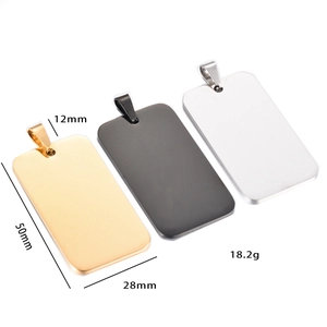 Stainless steel dog tag pendants in gold, black, and silver finishes for engraving
