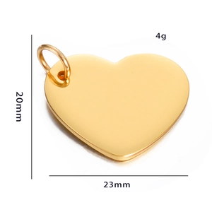 Detailed view of gold mirror polished heart pendant with 23mm width measurements