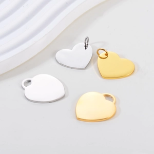 Polished stainless steel heart-shaped pendants in gold and silver for DIY jewelry