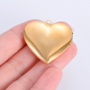 Polished gold stainless steel heart locket pendant with hinge for photos