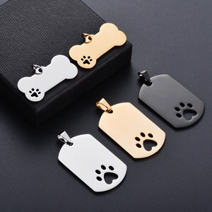 Placas de acero inoxidable pulido en forma de hueso y escudo con huella recortada