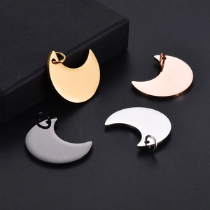 Polished crescent moon pendants in gold, rose gold, silver and dark grey stainless steel