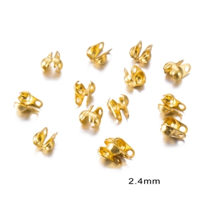 Detailed view of 2.4mm golden stainless steel clamshell bead tips for DIY jewelry
