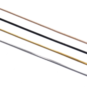 Detail view of square snake chains in rose gold, black, gold and silver stainless steel