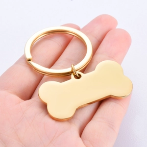 Goldener Hundemarke in Knochenform aus Edelstahl mit poliertem Spiegel-Finish am Schlüsselring