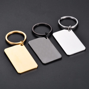 Polished rectangular stainless steel keychains in gold, black, and silver for engraving