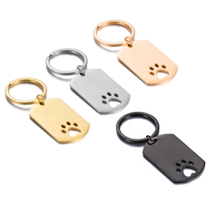 Polished stainless steel dog paw hollow out keychain pendants in four metallic finishes