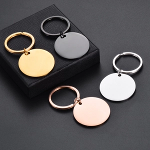 Polished stainless steel round blank keychains in gold, black, silver, and rose gold finishes