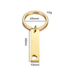 Gold stainless steel keychain with hollow heart pendant and precise dimensions marked