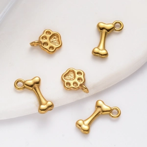 Colgantes dorados de acero inoxidable con huella y hueso para collares y joyas DIY