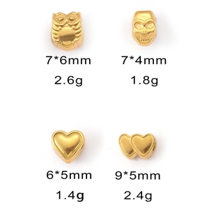 Detailed view showing dimensions and weight of owl and skull gold beads for jewelry making