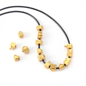 DIY charm necklace with stainless steel heart owl and skull beads on black cord