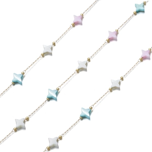 Detail of colorful star-shaped shell beads on gold stainless steel DIY jewelry chains