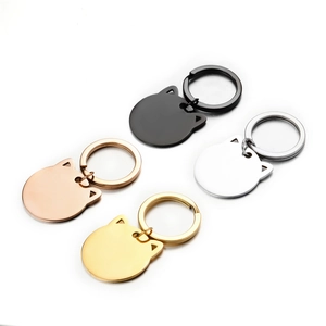 Polished stainless steel cat head keychains in black, rose gold, silver, and gold finishes
