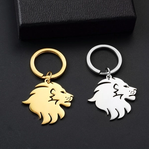Lion head silhouette keychains in gold and silver finish, polished stainless steel