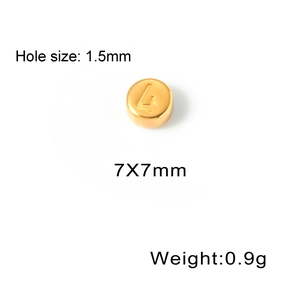 Macro detail of 7x7mm gold stainless steel bead with engraved number 4 for DIY jewelry