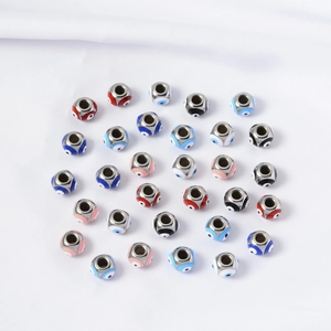 Macro shot of 8mm enamel evil eye square beads in various colors for DIY jewelry making