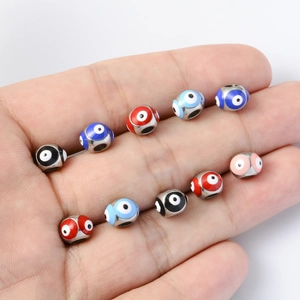 8mm stainless steel evil eye enamel beads for DIY jewelry making shown in hand