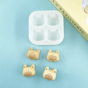 Four-cavity cartoon bear silicone mold for handmade chocolate, candles, and resin crafts