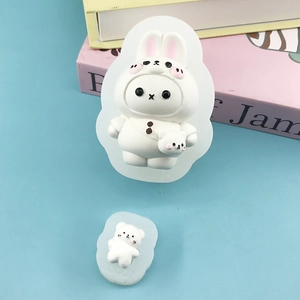 DIY silicone mold featuring cute cartoon rabbit astronaut designs for soap and candles