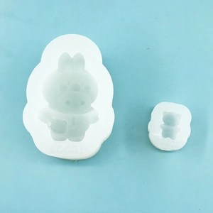 Close-up of flexible translucent silicone molds for DIY rabbit and bear shapes