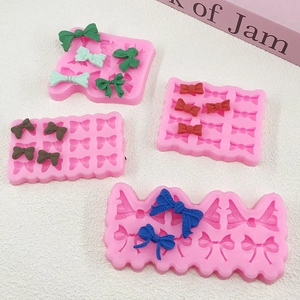 Pink silicone fondant bow molds set for cake decorating and DIY clay crafts in multiple sizes
