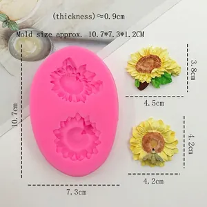 Pink silicone sunflower mold for DIY fondant and cake decorating with two floral shapes