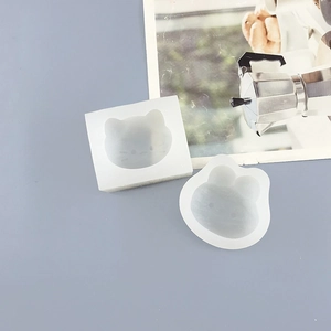 Detailed macro view of cat and rabbit silicone molds for DIY resin and chocolate making