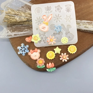 Silicone mold featuring flowers and animals with colorful resin craft accessories