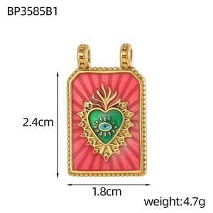 Detailed view of Baroque rectangle pendant with red enamel and blue evil eye design