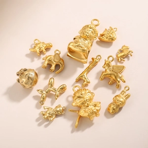 Assorted 3D vacuum plated gold animal pendants including rabbit elephant and dinosaur shapes