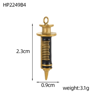 Detail view of retro gold syringe pendant with scale textures and size measurements