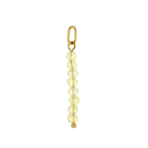 Detailed view of faceted yellow stones on vertical golden stainless steel pendant
