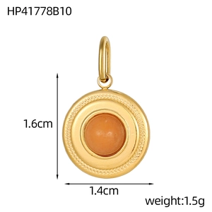 Detailed view of 1.6cm round gold stainless steel pendant with orange natural stone