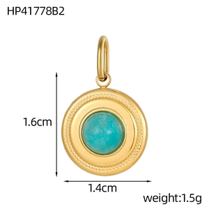 Detailed view of vintage gold pendant with blue turquoise stone inlay and dimensions