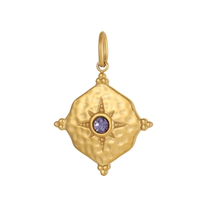 Detail of gold-plated geometric charm with hammered texture and purple zircon starburst