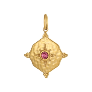 Detailed view of gold hammered oval pendant featuring a pink birthstone and star carving