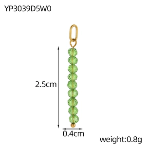 Macro shot of 2.5cm green faceted bead charm with gold loop for DIY jewelry making